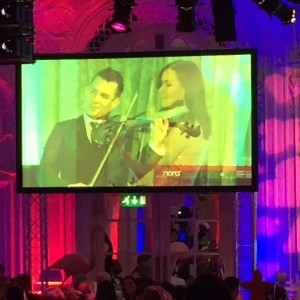 FUSE electric violinists peform