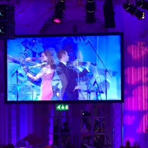 FUSE electric violinists peform